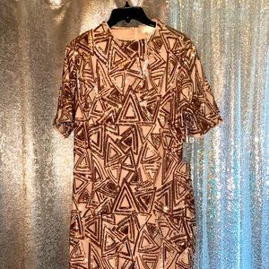 Sparkle in this cute little number. Great for a celebration/date night